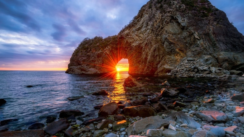 non-urban scene, rock, coast, sunset, orange color, sky, solid, arc, ocean, rock formation, sun, lens flare, water, scenics - nature, sunrise, nature, 1080P
