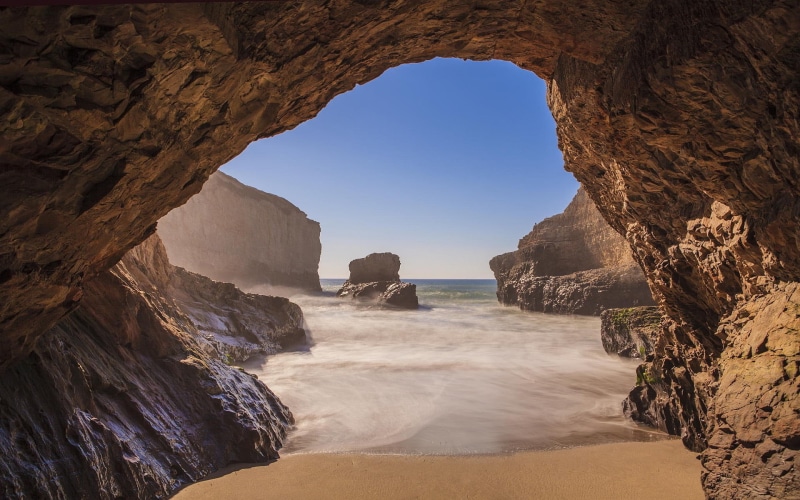 nature, no people, cave, natural arch, outdoors, brown, physical geography, rock, scenics - nature, sea, sky, landscape, formations, rock - object, beauty in nature