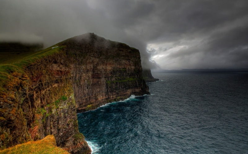 sky, no people, ominous, sea, rock - object, body, power in nature, land, solid, cloud - sky, tranquility, cliff, water, storm, coast, landscape, Faroe Islands