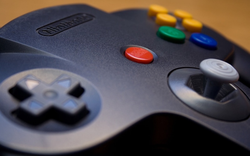 push button, nostalgia, western script, selective focus, close-up, connection, remote control, video games, control, arts culture and entertainment, controllers