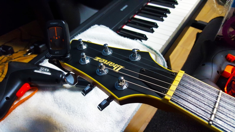 piano, high angle view, guitar, musical instrument, electric guitar head, industry, equipment, no people, indoors, string, studio, string instrument, control