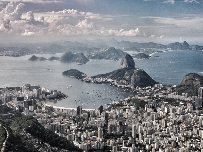near, built structure, no people, skyscraper, sky, building exterior, office building exterior, scale, architecture, mountain, scenics - nature, bay, whit