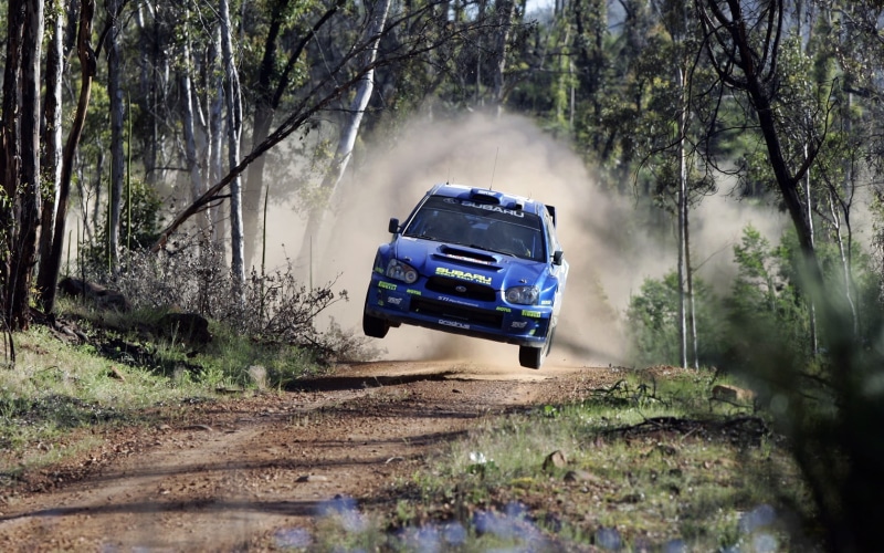 smoke - physical structure, on the move, mode of transportation, dirt road, 720P, outdoors, field, transportation, racing, jumping, motion, car, plant