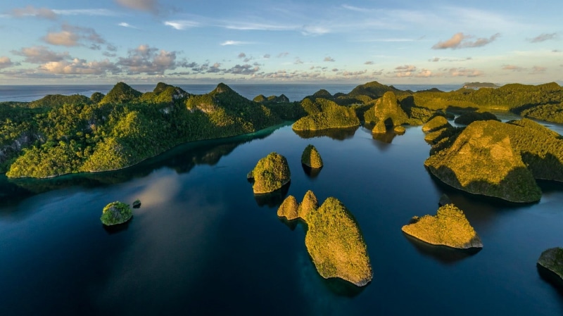 sunset, 720P, non-urban scene, sea, tropical, water, waterfront, no people, tranquility, aerial view, outdoors, island, rock - object, sky, nature, idyllic