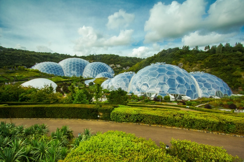 greenhouse, tranquil scene, tranquility, growth, sky, outdoors, green color, no people, day, architecture, travel destinations, built structure, eden project
