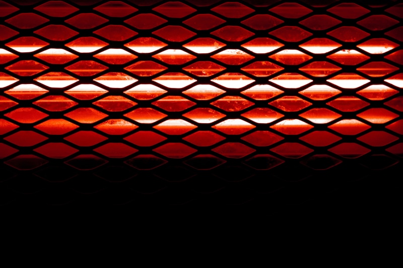 shape, black background, design, heater, repetition, grid, window, no people, metal, full frame, space, illuminated, textured, security, indoors, grate