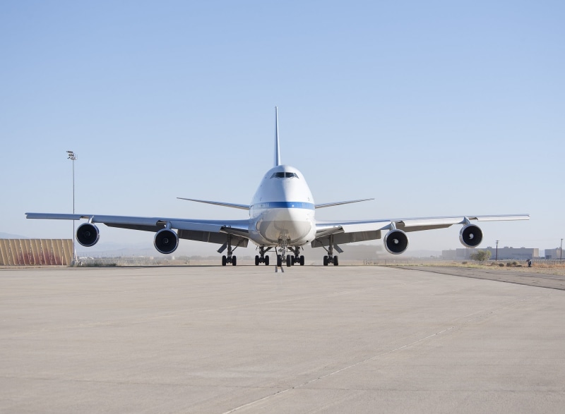 runway, airport runway, sky, commercial airplane, technology, airfield, airplane, air vehicle, nature, gray, travel, science, no people, white, modified