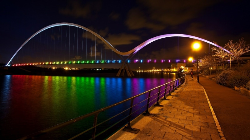 city, landmark, light, tees, lighting, sky, modern bridge, bridge, river tees, infinity bridge, colorful, evening, architecture, water, united kingdom