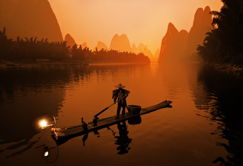wooden, people, east Asian Culture, orange color, dawn, nautical Vessel, nature, sky, river, silhouette, bamboo - Plant, rural Scene, guangxi Zhuang Autonomous Region - China