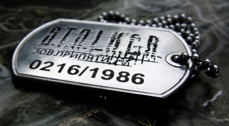 arts culture and entertainment, western script, silver, Call Of Pripyat, S.T.A.L.K.E.R., focus on foreground, law, dog, call, pripyat, necklace, high angle view