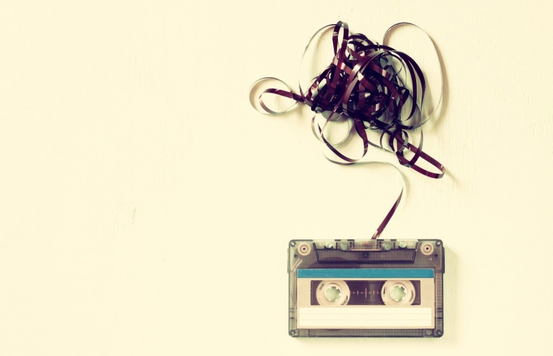 copy space, still life, power supply, music, listening, equipment, no people, technology, white background, studio shot, close-up, tape, connection, retro styled