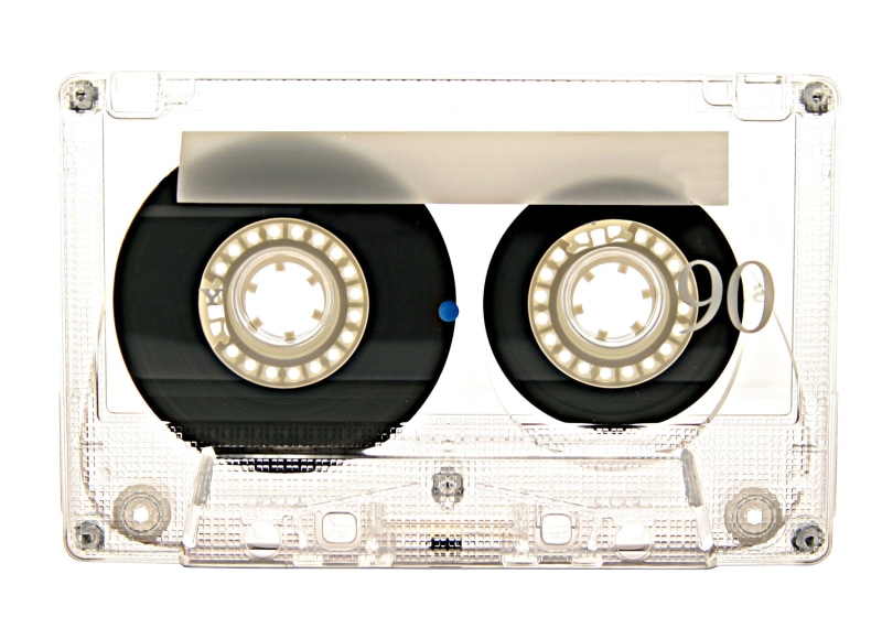 communication, indoors, black, noise, technology, electrical equipment, white background, still life, tape, studio shot, no people, equipment, circle, music