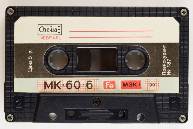 black color, audio Cassette, magnetic foil, no people, retro Styled, mk, text, communication, industry, radio, equipment, old-fashioned, magnetic tape