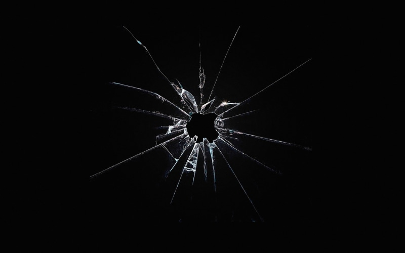 logo, ipad, arts culture and entertainment, pattern, lighting equipment, indoors, copy space, air, dark, broken, fragility, destruction, window, illuminated