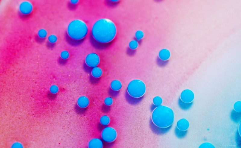 2K, still life, pink color, high angle view, large group of objects, choice, indoors, variation, multi colored, magenta, cyan, selective focus, Bright