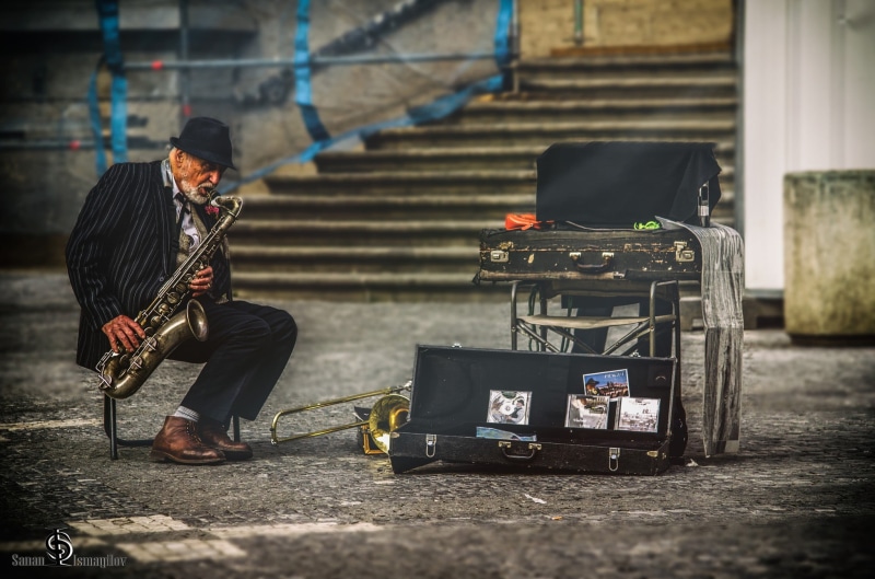 Jazz, saxophone, music, focus on foreground, transportation, occupation, clothing, architecture, gray, full length, lifestyles, casual clothing, saxophones