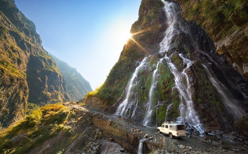 sun rays, waterfalls, landscape, Nepal, waterfall, dirt road, formations, shrubs, rock, 480P, sunlight, vehicle, nature, mountains, moss