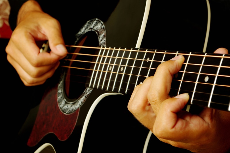 electric guitar, plays, human body part, music, rock music, cutaway, blur, sound, arts culture and entertainment, one person, acoustic guitar, black, holonic