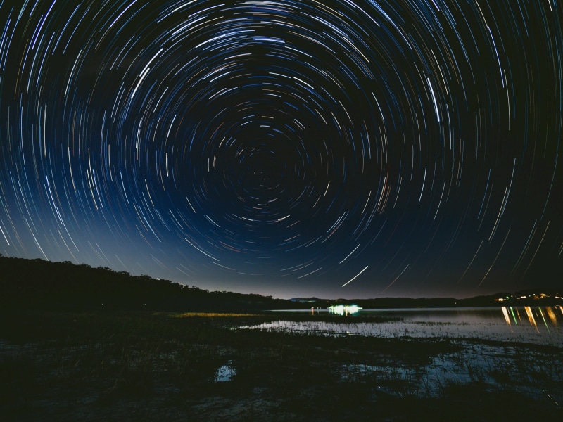 space, land, star trail, beauty in nature, water, star, astronomy, no people, sea, sky, space and astronomy, lake, star field, nature, scenics - nature