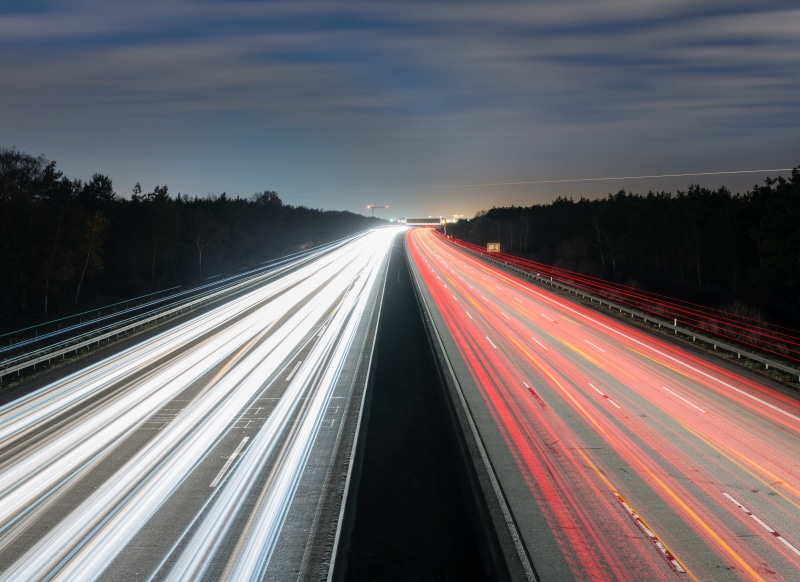 light trails, street, light trail, no people, multiple lane highway, traffic, tail light, speed, motion, night, blurred motion, road, transportation, highway