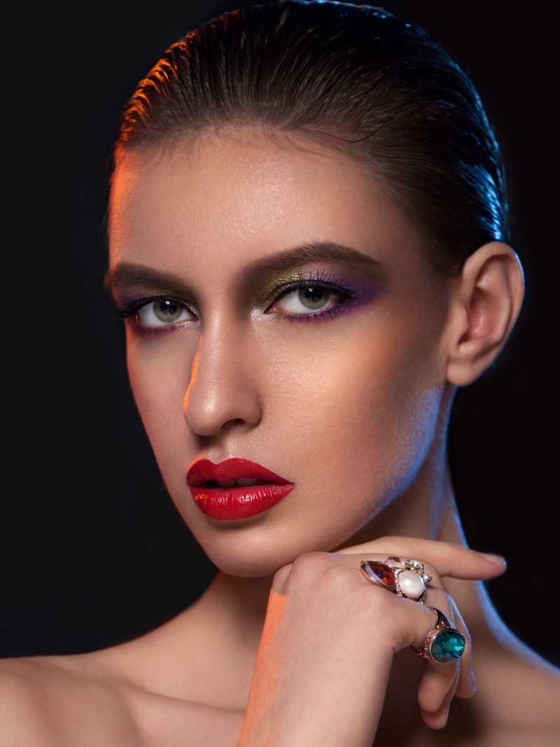 one person, high-end, human face, fashion model, adult, retouching, looking at camera, glamour, headshot, black background, nail, hairstyle, hand, studio shot