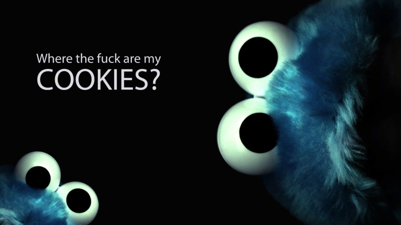 dark background, close-up, indoors, Cookie Monster, fictional creatures, toy, shape, technology, art and craft, studio shot, black background, listening
