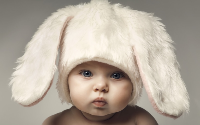 hairstyle, childhood, themed, headshot, 2K, looking at camera, one person, girls, front view, baby, studio shot, fur, face, close-up, aviator, indoors