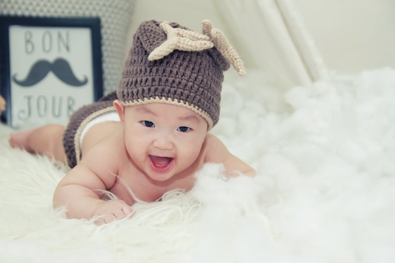 knit hat, baby Girls, looking at camera, photoshoot, happy, cheerful, tiny, mouth open, child, happiness, smiling, childhood, newborn, young, infant, caucasian Ethnicity