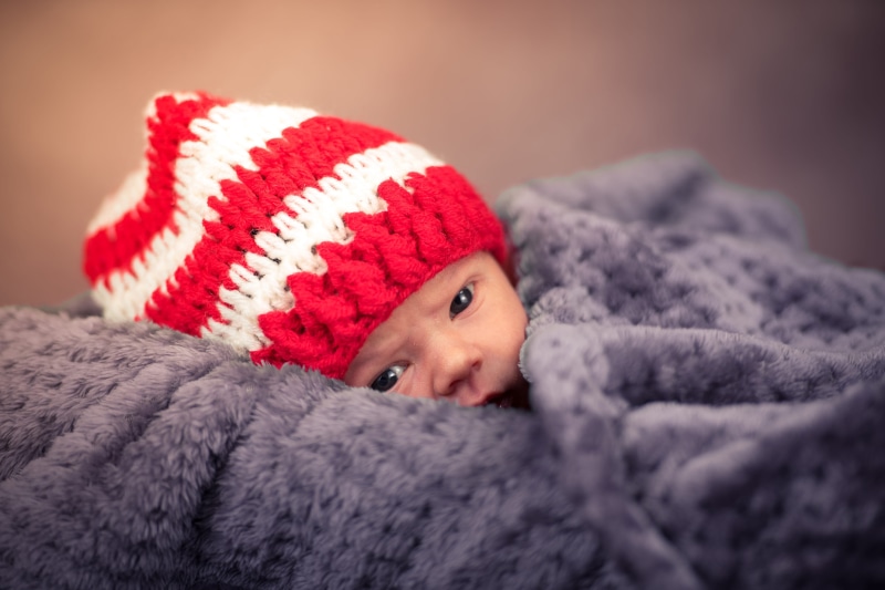 comfortable, headshot, small, cold temperature, cute, child, teenager, hat, scarf, looking at camera, wool, glove, blanket, relaxation, innocence, one Person