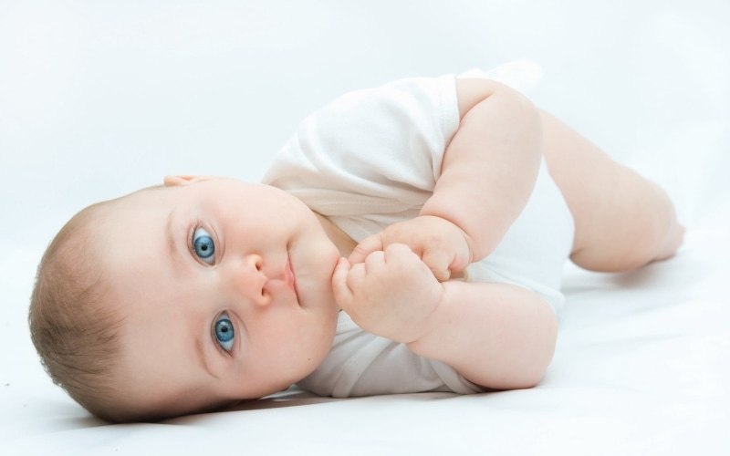 blanket, onesie, s, smiling, one Person, joy, lifestyles, innocence, indoors, cute, toddler, people, portrait, cheerful, white, softness, studio Shot, happiness