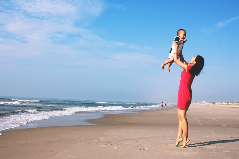 mother, beach, leg, outdoors, family, people, sport, leisure activity, babies, full length, adult, sea, horizon over water, beauty in nature, mom, nature