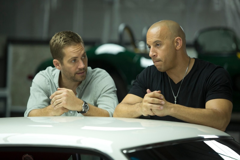 Dominic Toretto, table, real people, casual clothing, indoors, Brian OConner, young adult, front view, Fast and furious 6, car, adult, diesel, sitting