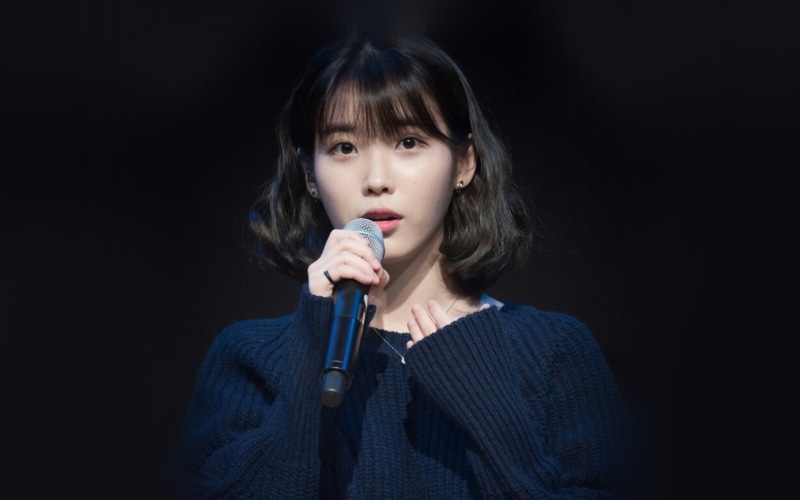 black hair, girl, 4K, long hair, one person, portrait, dark, innocence, holding, contemplation, looking at camera, kpop, studio shot, brown eyes, hairstyle