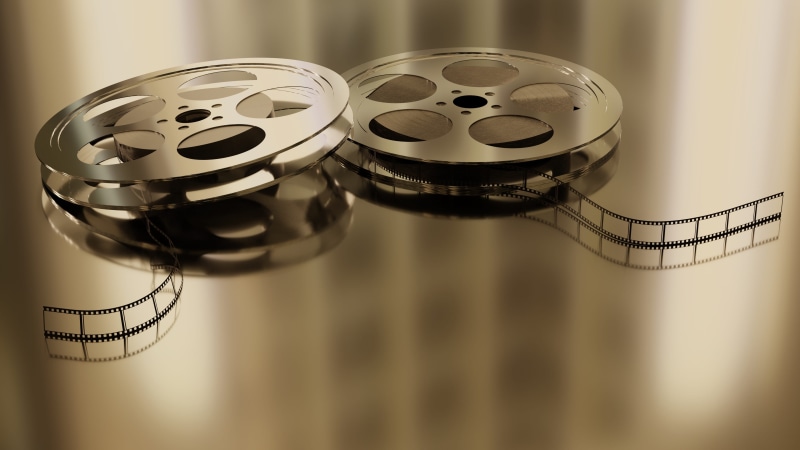film industry, equipment, geometric shape, connection, pattern, indoors, vintage, film reel, camera film, two objects, reflection, close-up, copy space