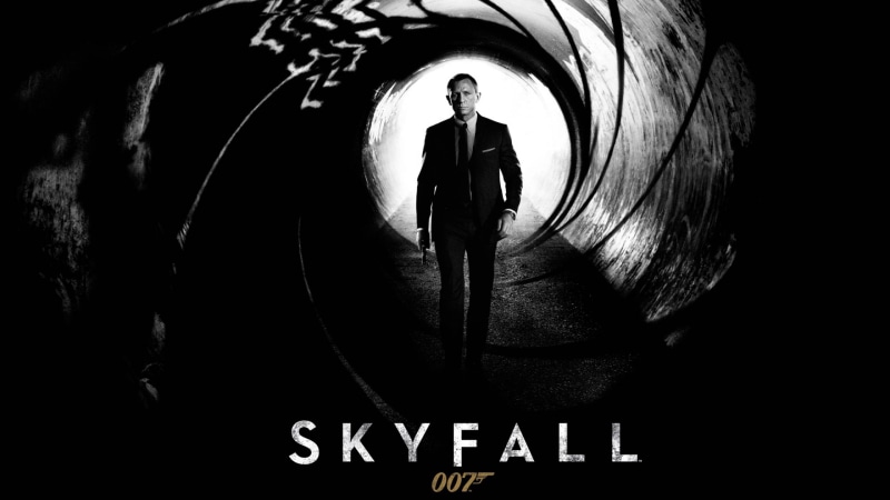 wall - building feature, technology, communication, one person, western script, 007, text, real people, Daniel Craig, rear view, Skyfall, day