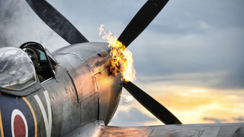 car, smoke - physical structure, sky, Royal Airforce, plane, land vehicle, airplane, propeller, conflict, no people, explosive, nature, Supermarine Spitfire