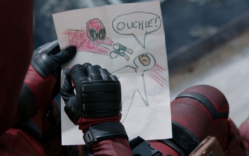 one person, Deadpool, text, indoors, high angle view, still, glove, book, 720P, communication, day, creativity, close-up, human hand, movie, hand, body part