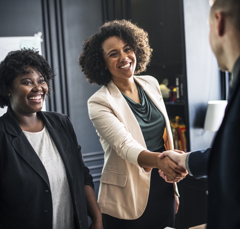 deal, woman, young men, waist up, agreement, shaking hands, office, business person, man, assistant, marketing, happiness, accomplished, partnership, emotion