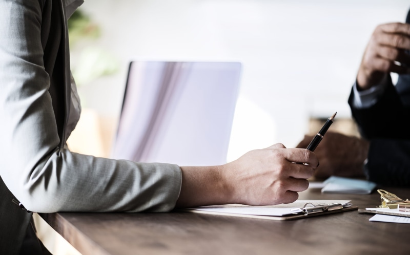 english, white, formal businesswear, composition, room, sit, person, conversation, caucasian, notes, jacket, startup, advice, document, paper, paperwork