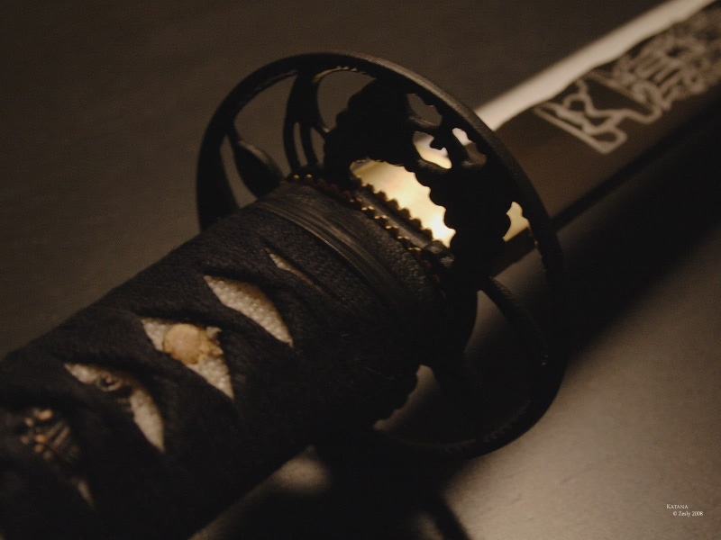 representation, weapon, arts culture and entertainment, no people, shoe, indoors, black, handled, creativity, samurai, shadow, communication, katana, pattern