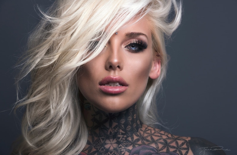 women, looking at camera, studio shot, adult, tattoo, one person, hairstyle, fashion, young adult, headshot, portrait, Girl, black background, human face