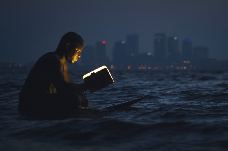communication, book, building exterior, built structure, illuminated, student, ocean, building, architecture, holding, outdoors, one Person, Man, education
