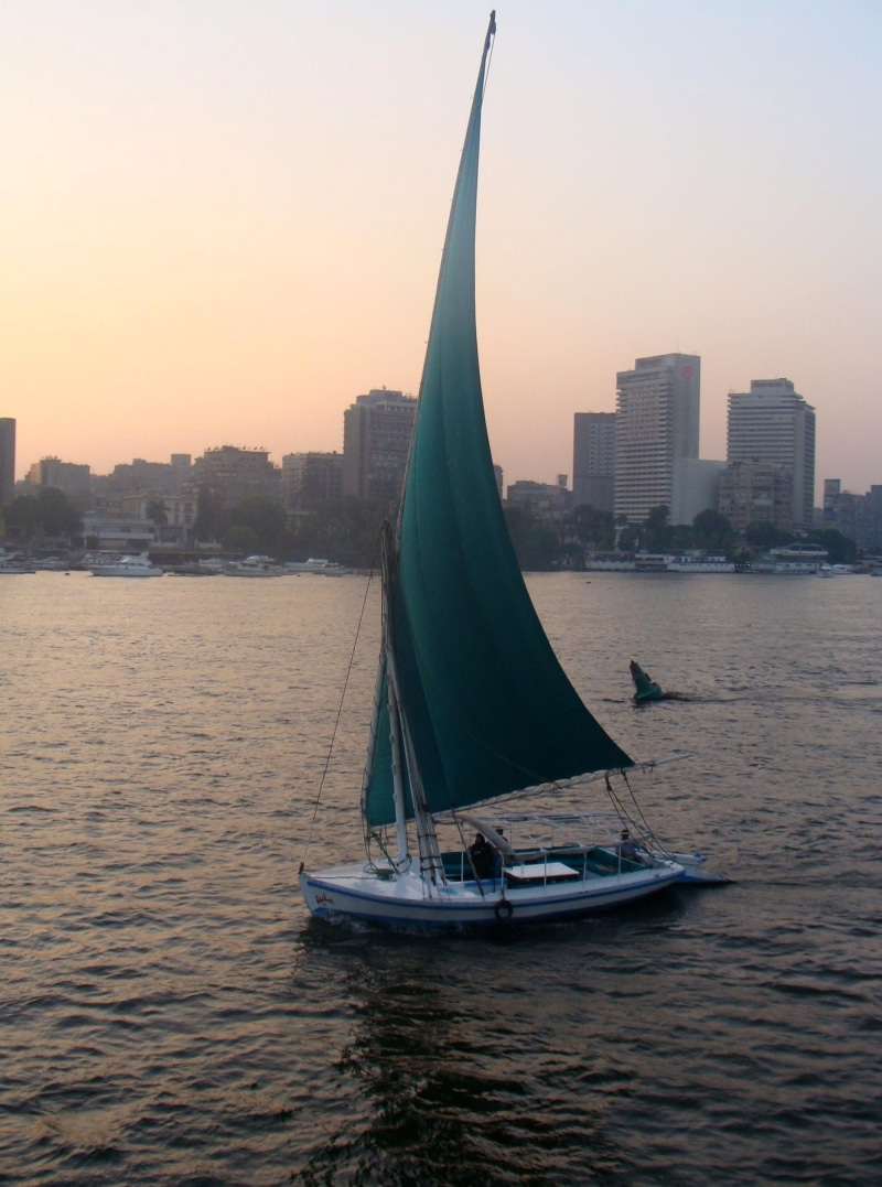 building exterior, clear sky, famous Place, sky, asia, outdoors, sailboat, nature, sea, built structure, waterfront, river, no people, water, Cairo, public domain