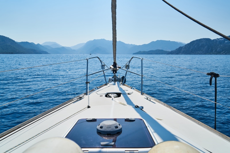 no people, landscape, nautical vessel, maritime, blue, travel, marine, beach, water, yacht, sail, mode of transportation, mountain range, scenics - nature