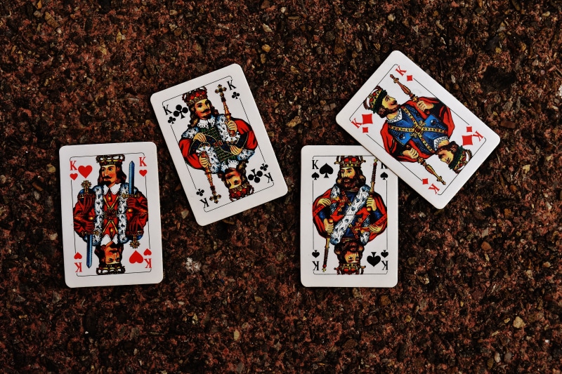 close-up, poker - card game, christmas, playing cards, heart, diamonds, indoors, representation, communication, choice, cards, history, pik, high angle view