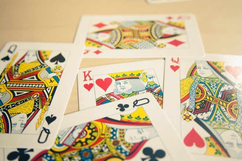 table, pattern, cards, gambling, leisure games, kings, human representation, paper, 2K, indoors, playing, queens, casino, art and craft, close-up, still life