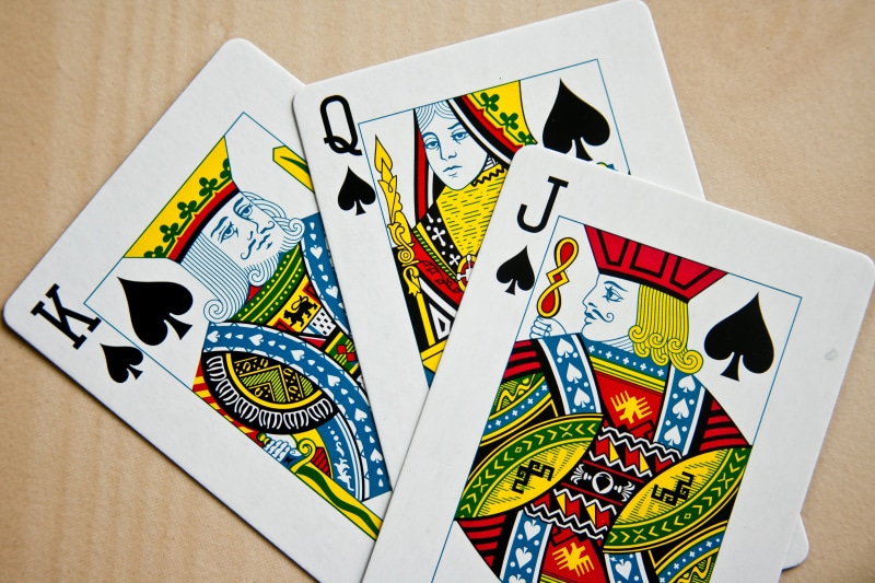 male likeness, close-up, high cards, poker - card game, indoors, luck, three, high angle view, jack, 2K, playing, relaxation, leisure games, no people