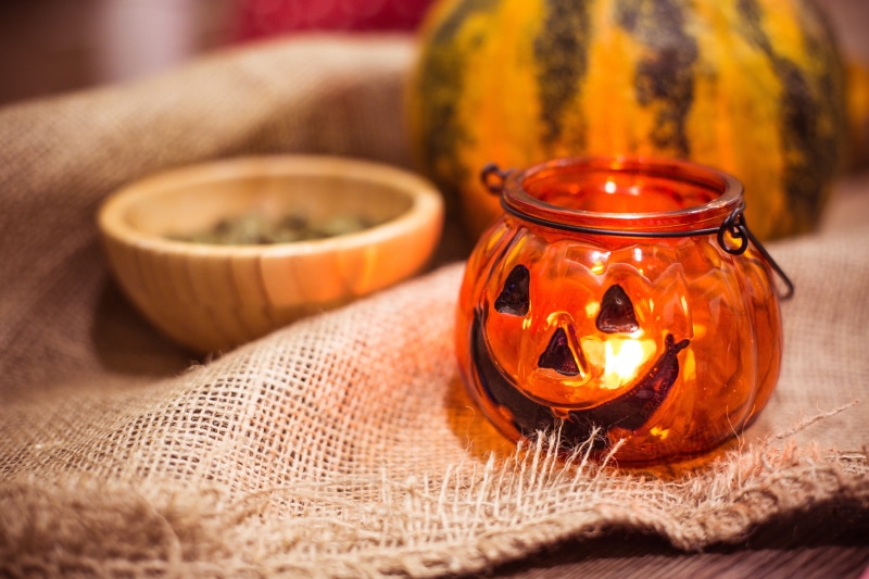 season, container, holiday, preparing, no people, flame, holder, leaf, burning, cultures, pumpkin seeds, candle, orange Color, rustic, backgrounds, candles