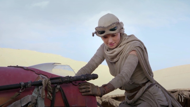s, gray, Rey (from Star Wars), transportation, clothing, standing, real people, waist up, mode of transportation, sky, young adult, women, front view, one person