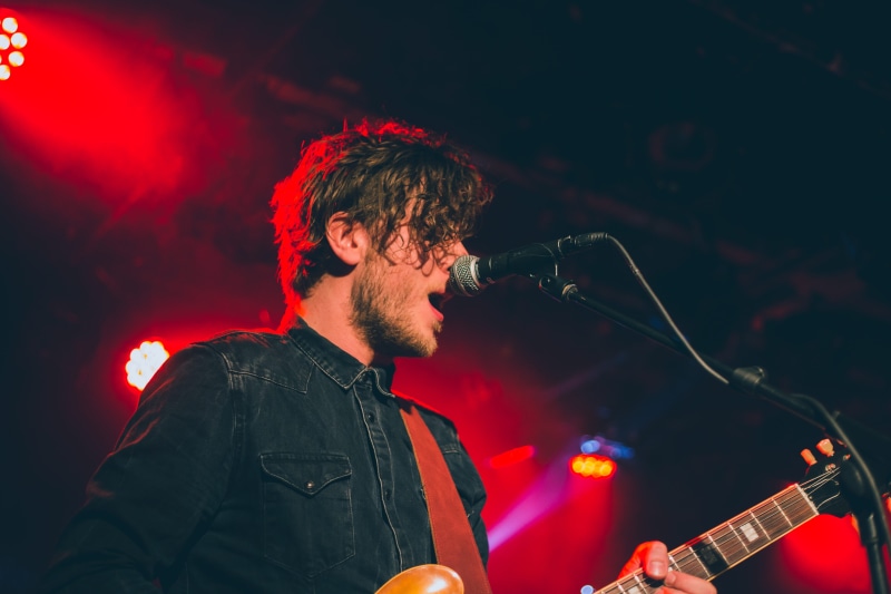 adults only, performance, pop Musician, microphone stand, acoustic guitar, modern Rock, musician, enjoyment, man, stage, one Person, skill, guitar, light
